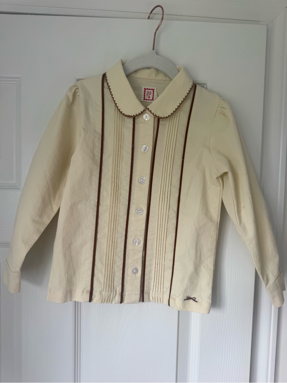 Cream Girls' Button-Front Jacket w/ Brown Trim- pair with brown jumper in closet